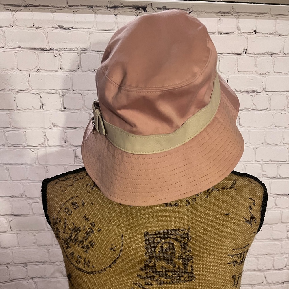 Coach pink bucket hat with cream trim, size small.  NWOT.